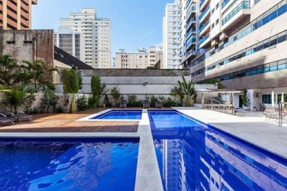 Apto Aconchegante: Beachfront Comfort with BBQ & Daily Cleaning Guaruja Exterior photo